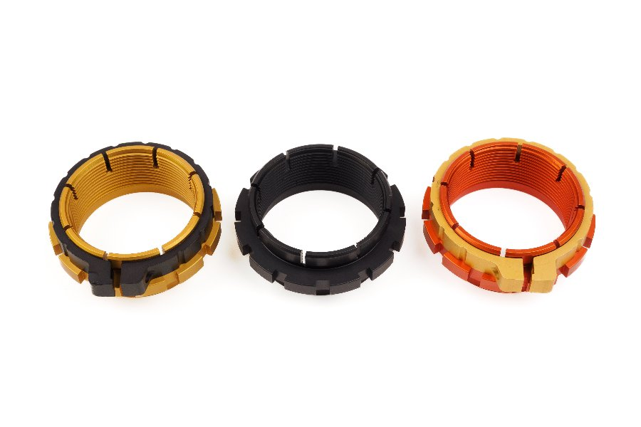 Anodized adjusters on the Supermoto shock in gold, black and orange